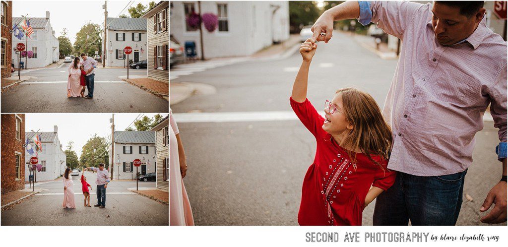 Family of three with one on the way in downtown Leesburg at 'golden hour', plus a random cat, by Northern Virginia maternity photographer.