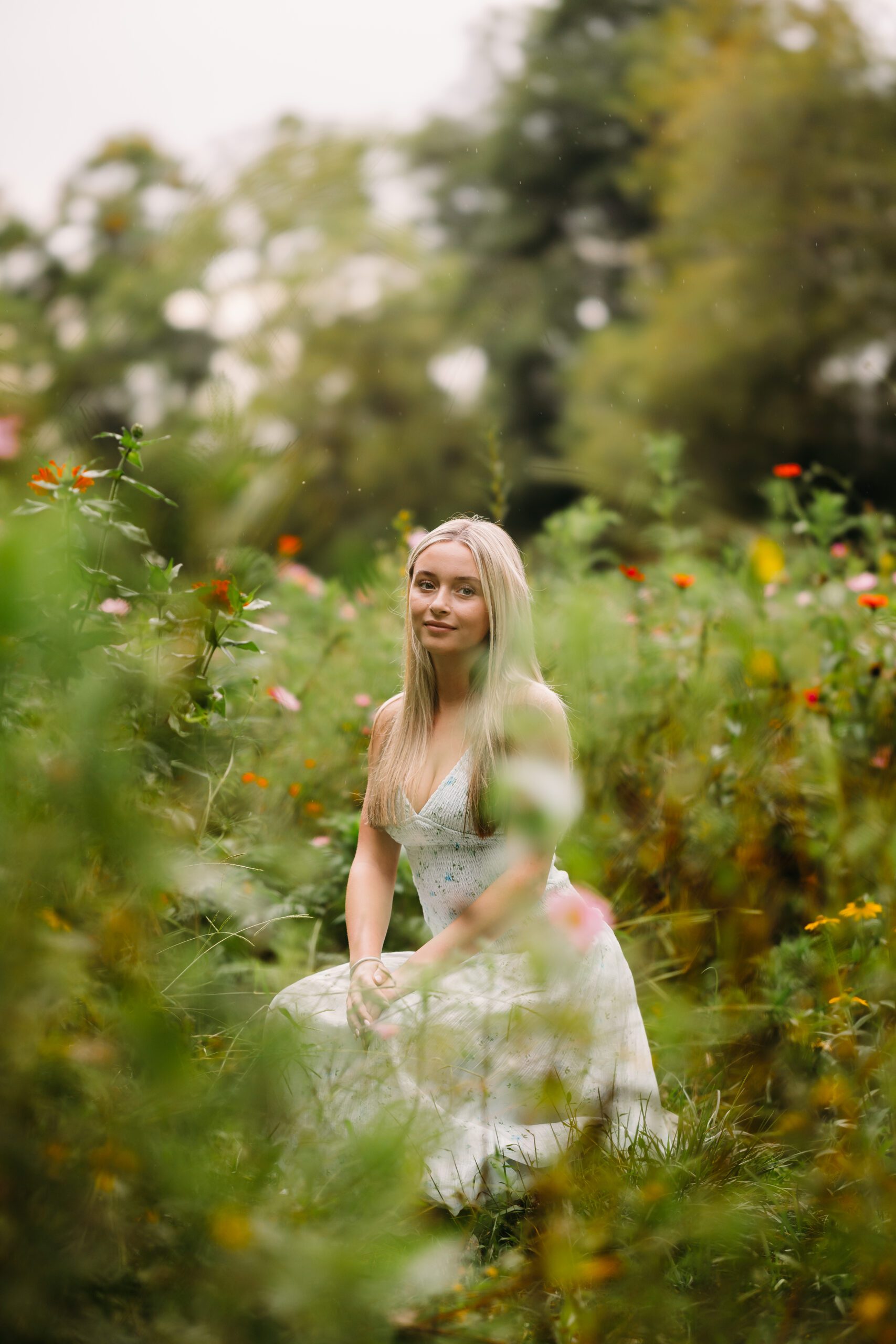 High School senior portraits in wildflower field