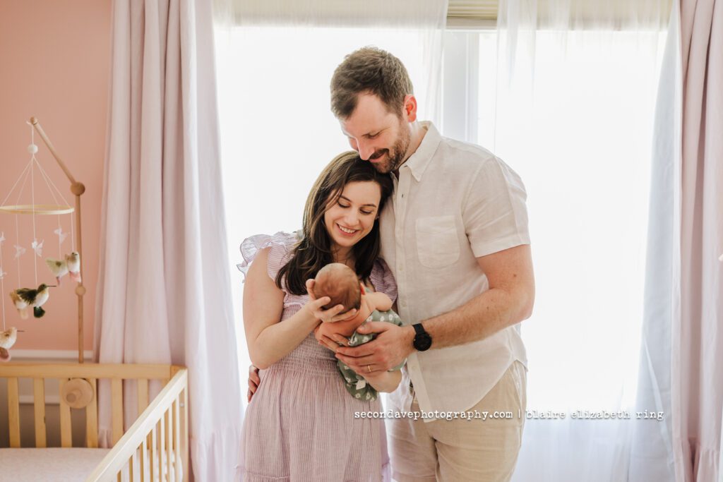 Picture of new family of 3 at newborn session in Reston VA.